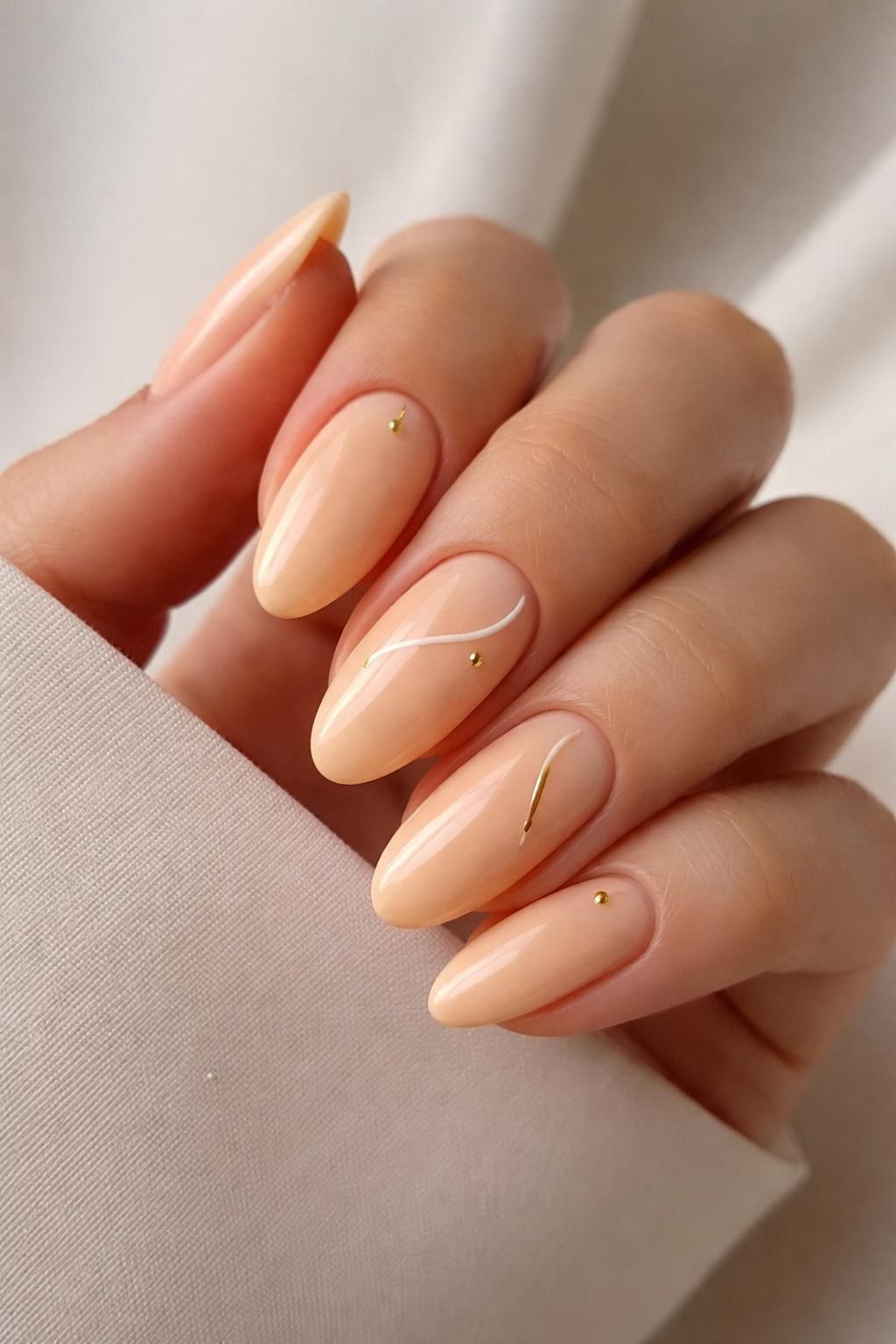 discover the chic and subtle charm of pastel orange nails, blending elegance with a soft, warm hue perfect for any occasion.